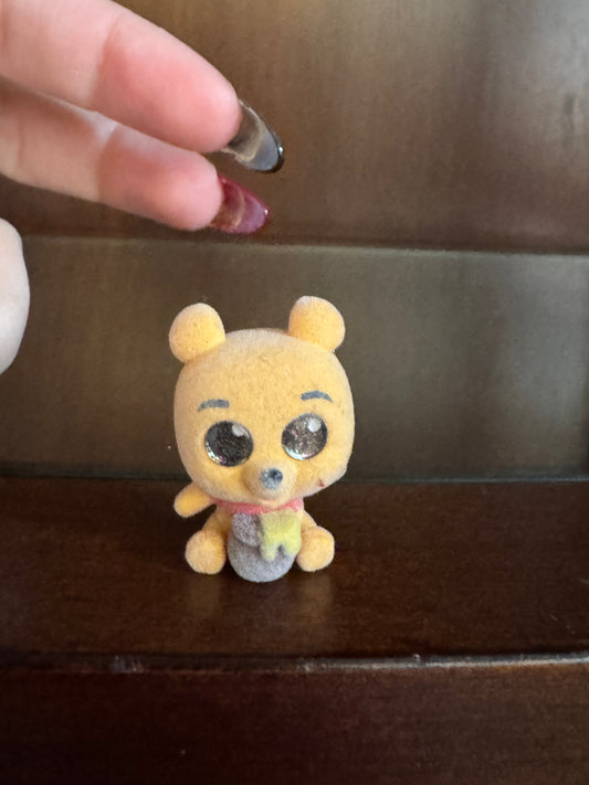 Flocked Winnie Holding Honey Pot